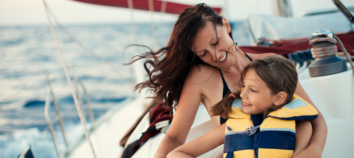 A mother with her child on a boat. Boat Safety.